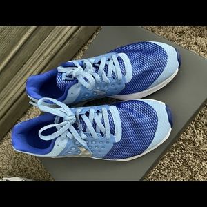 Blue Nike running shoes